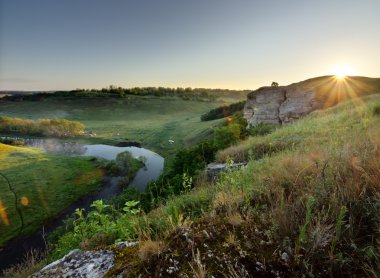 Beautiful landscape with bright sun and river