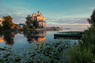 Wooden boat and church