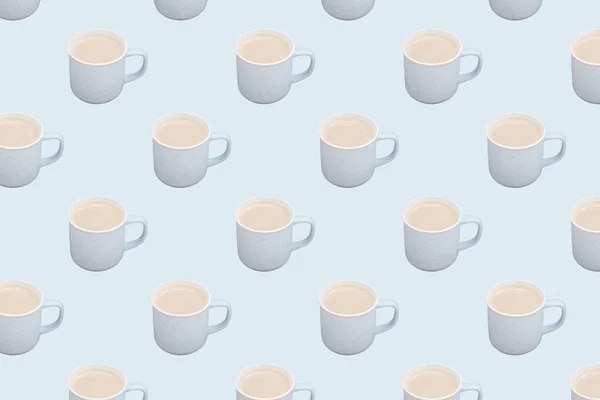 seamless pattern of milky coffee cup on light blue background