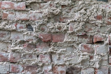 Eski tuğla ve beton desenli duvar  