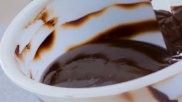 Chocolate being melted in a bowl — Stock Video