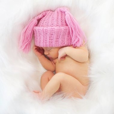 Sleeping newborn baby in the white clipart