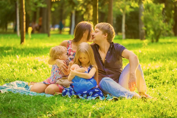 Happy family breastfeeding — Stock Photo, Image