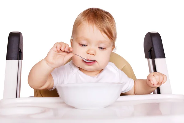 Baby food. Baby eating by himself — Stock Photo, Image