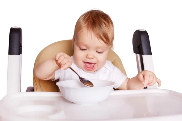 Comida para bebés. Bebé comiendo solo — Foto de Stock