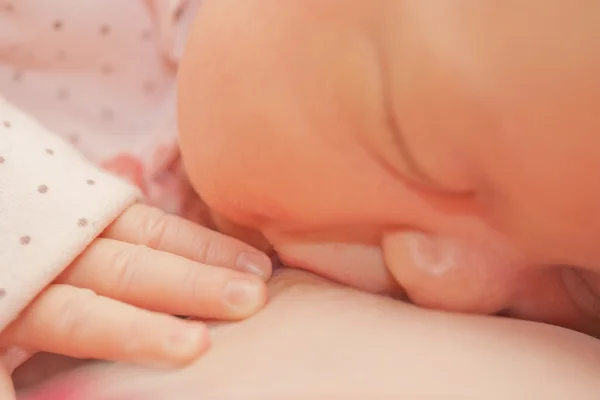 Mother breastfeeding newborn baby with breast milk — Stock Photo, Image