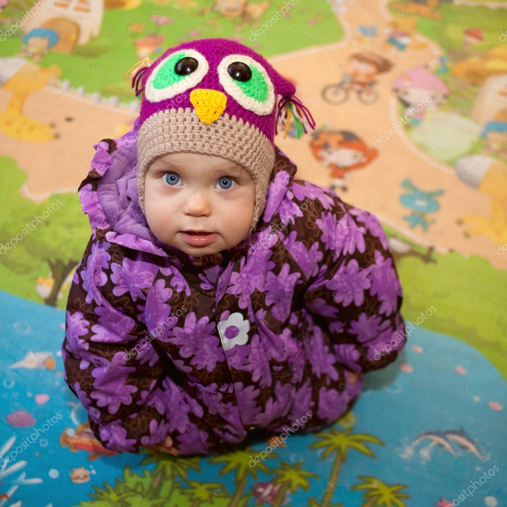 Little baby in winter clothes Stock Photo by ©Vitalinka 83571152