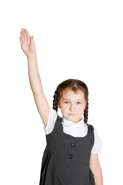 Uczeń szkoły podstawowej podnosząc jej rękę. — Zdjęcie stockowe
