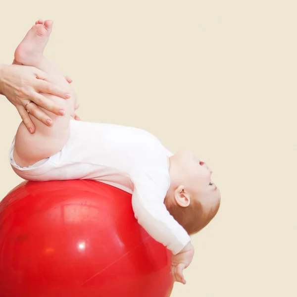 Baby fitness. Mother doing massage and gym — Stock Photo, Image