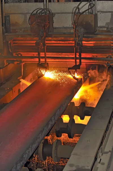 Gas cutting of the hot metal