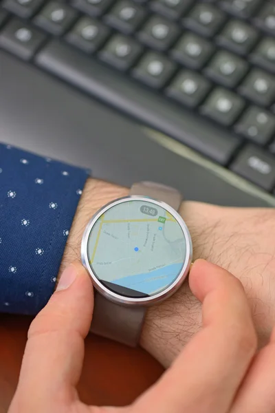 Hands with map on smartwatch — Stock Photo, Image