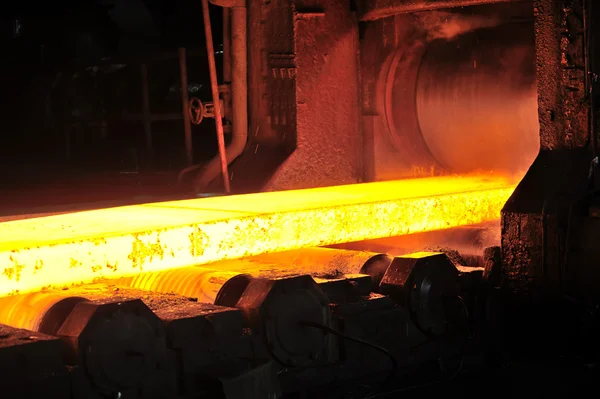 Hot steel plate on conveyor — Stock Photo, Image