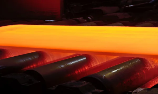 Steel plate on conveyor — Stock Photo, Image