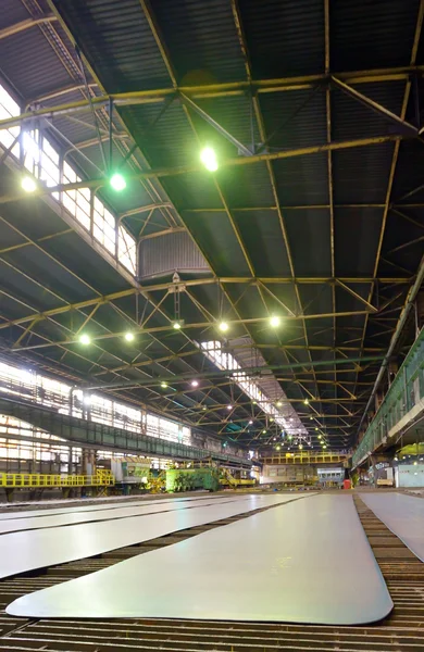 Steel plate on conveyor — Stock Photo, Image