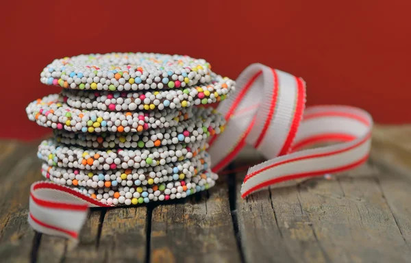 Christmas chocolate Sprinkle and ribbon — Stock Photo, Image