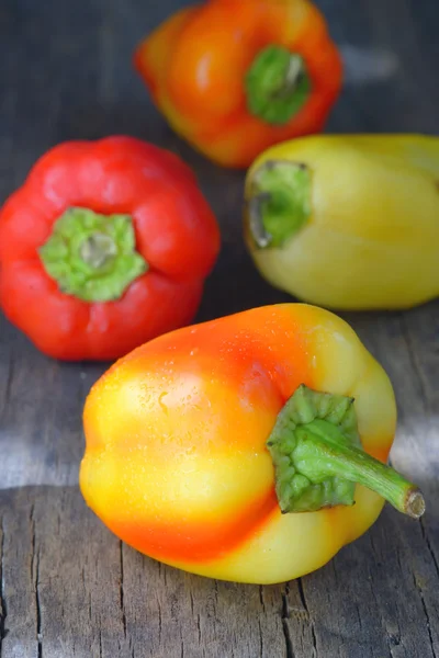Red and yellow sweet peppers — Stock Photo, Image