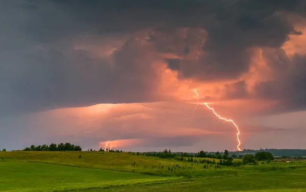 Thunder lightning storm clouds with lot of ligtning bolts — Stock Photo, Image