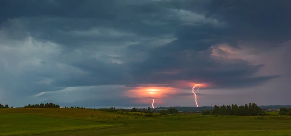 Thunder lightning storm clouds with lot of ligtning bolts — Stock Photo, Image