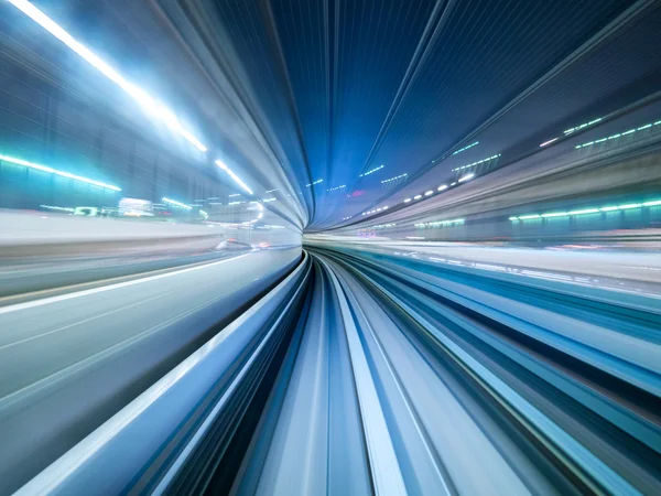 Motion blur of train moving inside tunnel in Tokyo, Japan Stock Picture