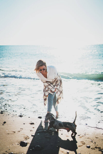 Elegant Blonde Woman Casual Outfit Bent Stroke Her Lovely Dog Stock Image