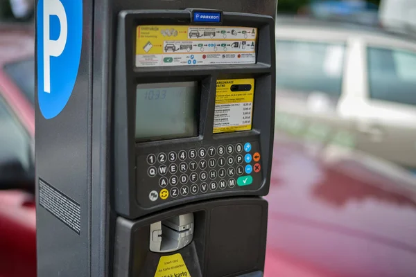 stock image WARSAW. POLAND - August 2015: The device for paying for parking in the background of cars.