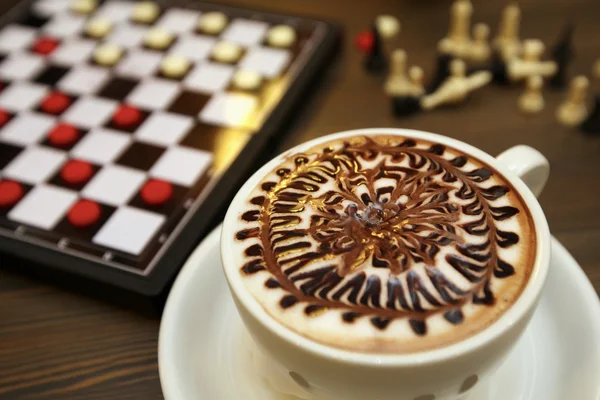 Cup of coffee and chess — Stock Photo, Image