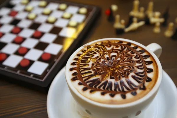 Cup of coffee and chess — Stock Photo, Image