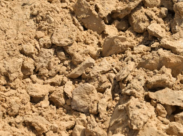 Stapel zand geïsoleerd op achtergrond — Stockfoto