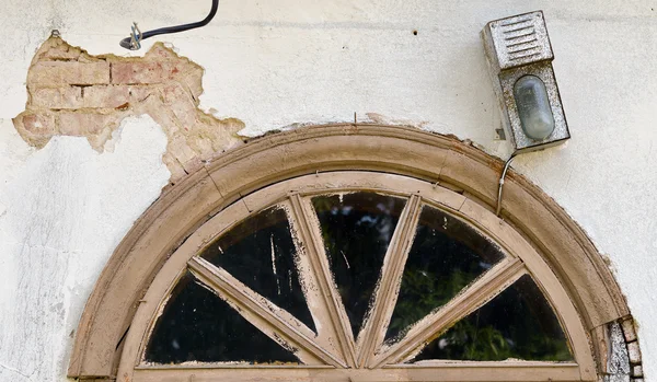 Old dirty window on wall — Stock Photo, Image