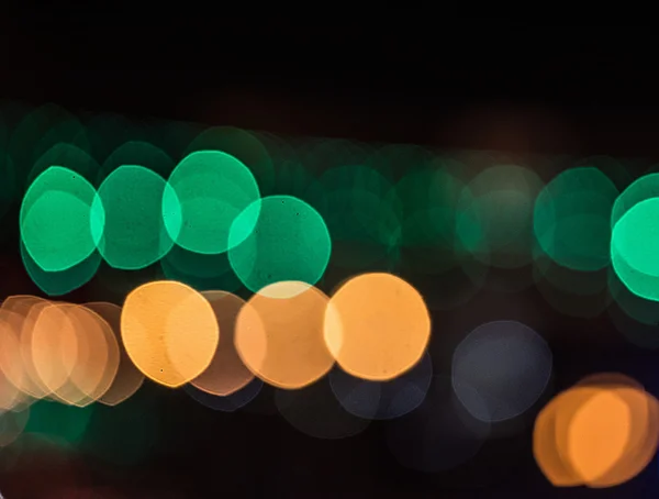 City lights blurred bokeh background — Stock Photo, Image