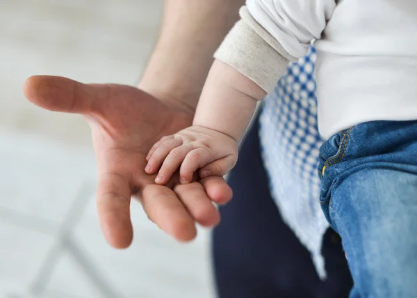 Father giving hand to a child — Stock Photo, Image