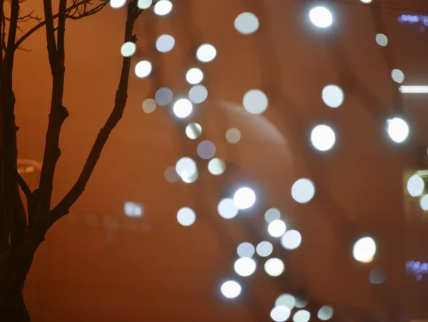 City lights in the background with blurring light — Stock Photo, Image