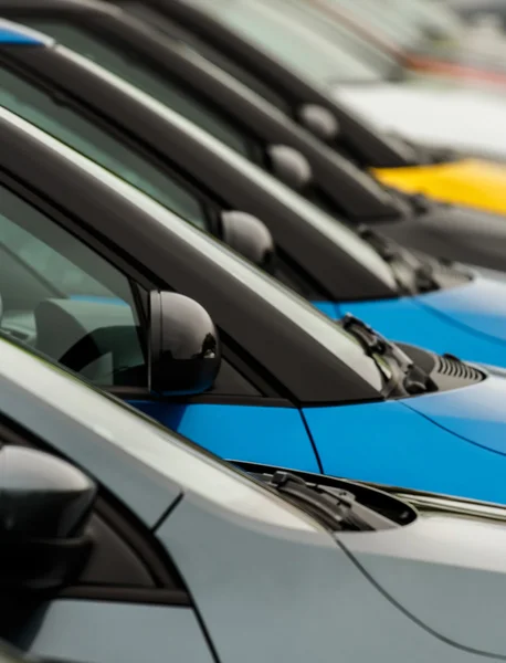 Car wingmirrors on display on dealers forecourt — Stock Photo, Image