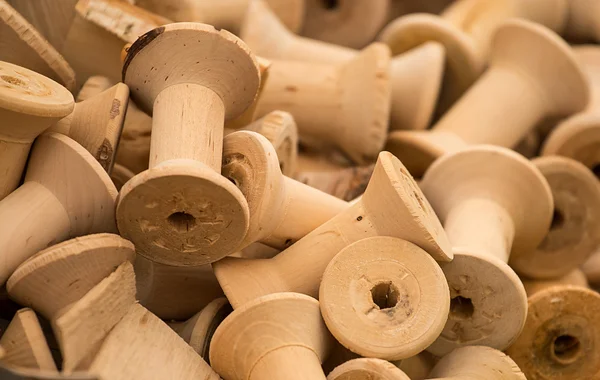 Wooden bobbins for thread Royalty Free Stock Images