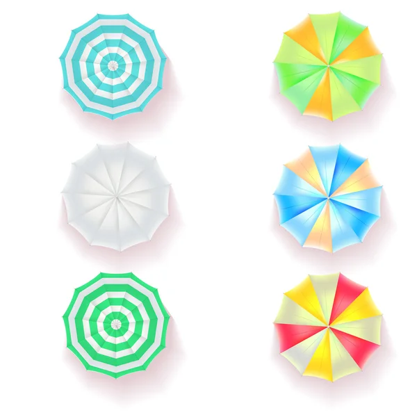 Sada barevných plážových deštníků — Stockový vektor