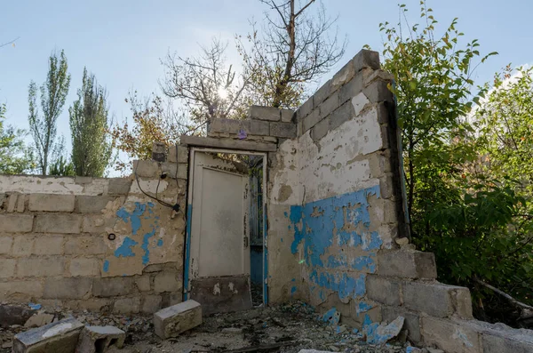 ruins of an old abandoned village house in Ukraine after the war