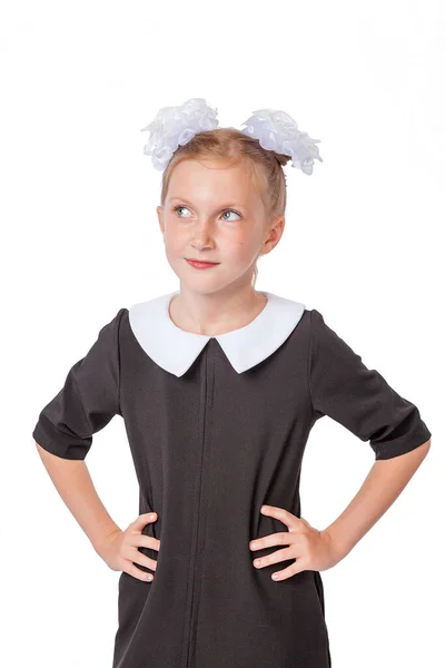 Schoolgirl Black School Dress Stands Rests Her Hands Sides Looks — Stock Photo, Image