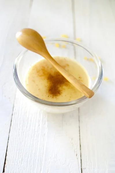 Custard pudding isolated on wooden background — Stock Photo, Image