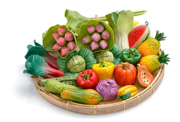 Variety of miniature clay vegetables in basket — Stock Photo, Image