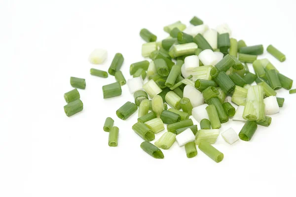 Close up image of chopped spring onions on a white background — Stock Photo, Image