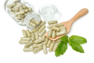 Görüntü üzerinde tahta kaşık bitkisel tıp kapatın