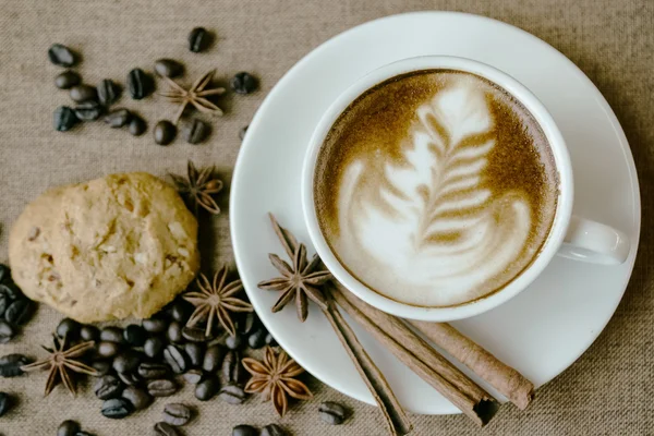 Cup of coffee and cookie in coffee shop vintage color — Stock Photo, Image