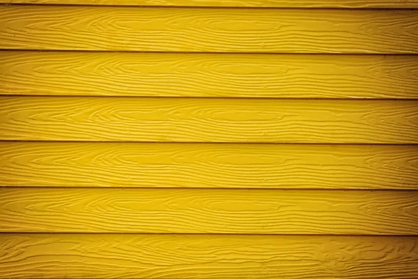 Parede de madeira amarela fundo — Fotografia de Stock