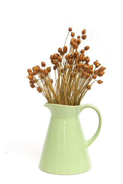 керамическая винтажная ваза с сушеным цветком
