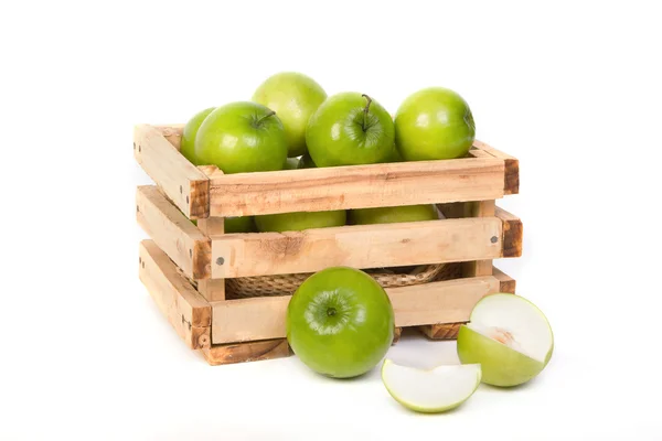 Green Monkey apple nebo bonbónů v dřevěné bedně — Stock fotografie