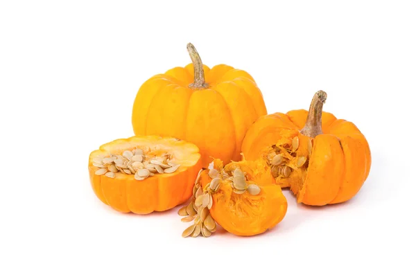 Freshly cut  pumpkin and seeds — Stock Photo, Image
