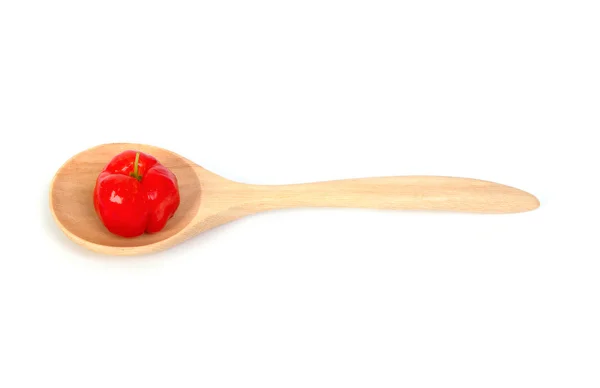 Barbado cherry in wooden spoon — Stock Photo, Image