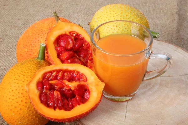 Gac Frucht, Baby Jackfruit und Saft — Stockfoto