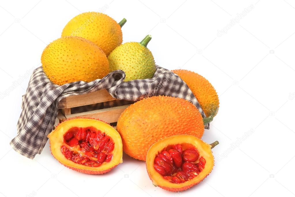 Gac fruit, Baby Jackfruit, Spiny Bitter Gourd in wooden crate