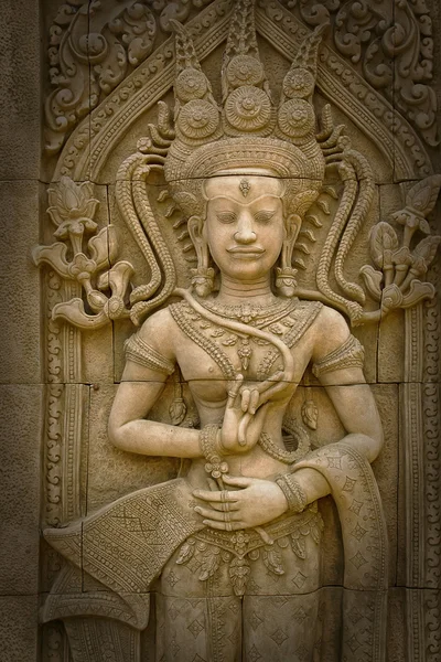 Esculturas de Apsara en Angkor Wat, detalle de tallas de piedra — Foto de Stock